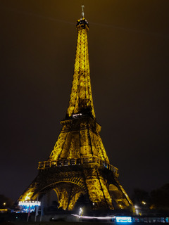 Paris, France — Eiffel Tower illuminated at night